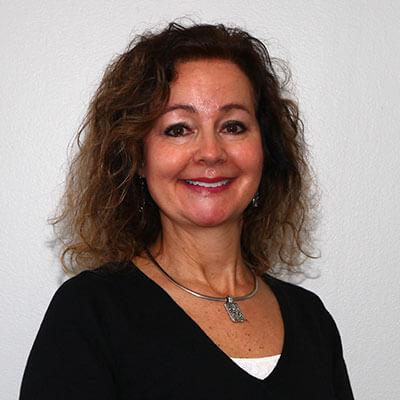 headshot of donna paine of grand marais state bank