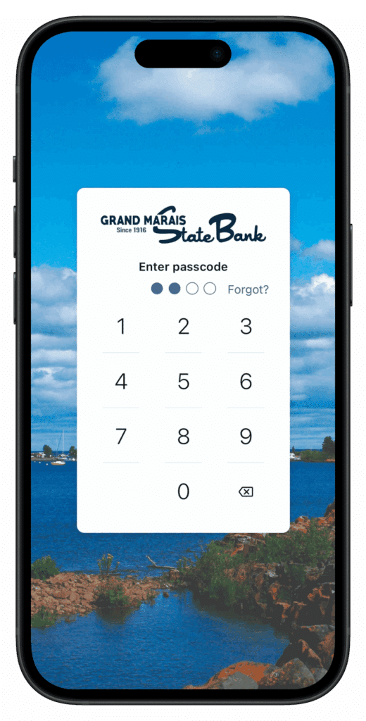 smartphone screen displaying the grand marais state bank web banker login screen with pin number pad