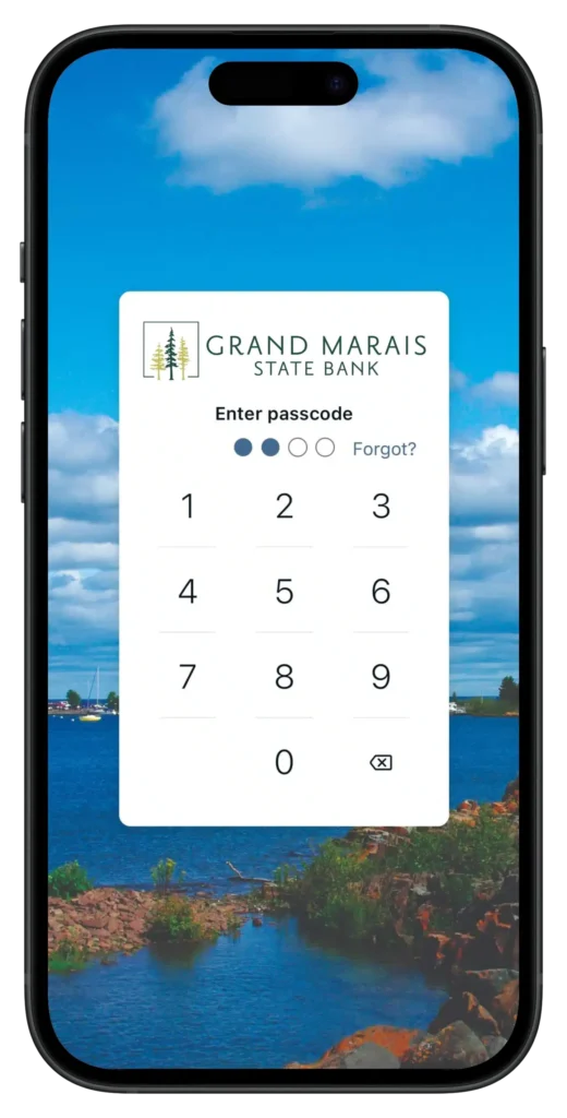 smartphone screen displaying the grand marais state bank web banker login screen with pin number pad